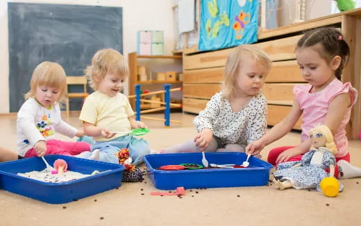 a group of children playing with toys