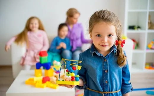 a group of children playing with toys