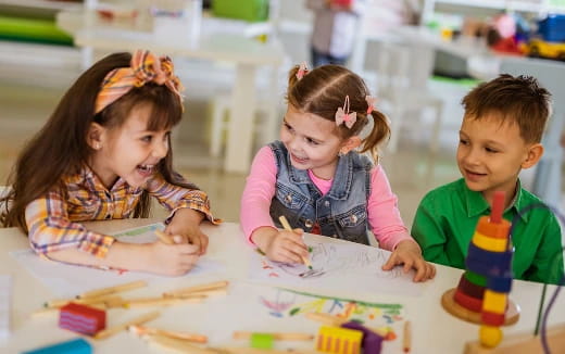 children sitting at a table