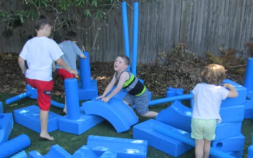 kids playing in a sandbox