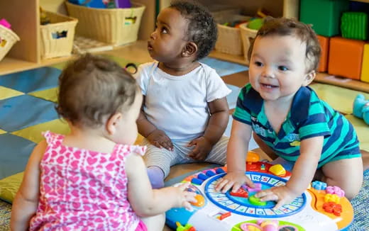 a group of children playing with toys