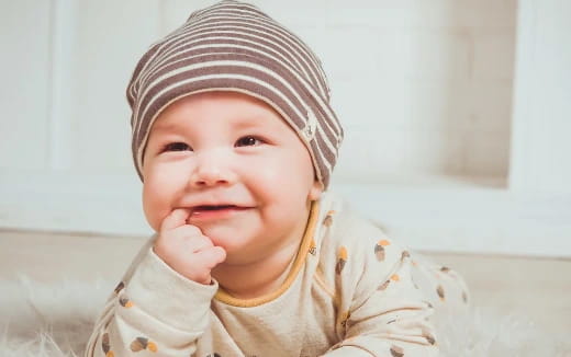 a baby wearing a hat