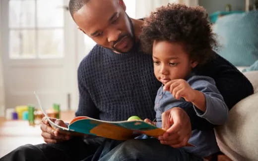 a person and a child eating