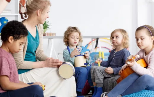 a group of children sitting on a couch