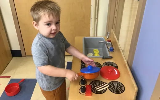 a boy cooking in the kitchen