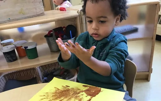 a young girl painting