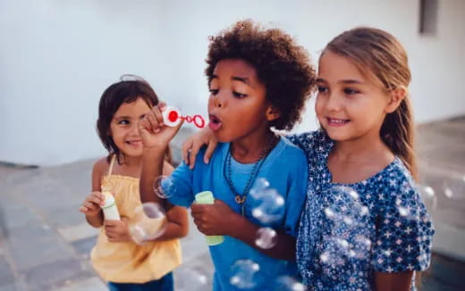 a group of girls holding objects