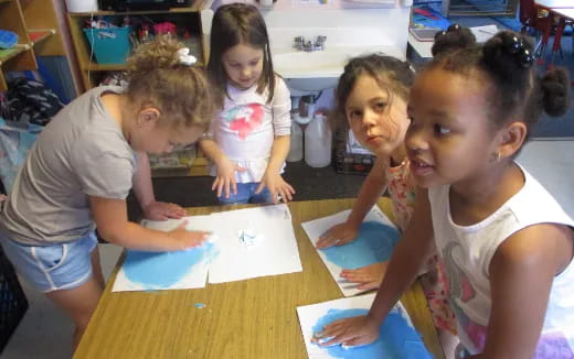 a group of children in a classroom