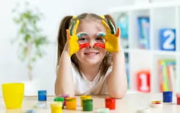 a child with paint on her face