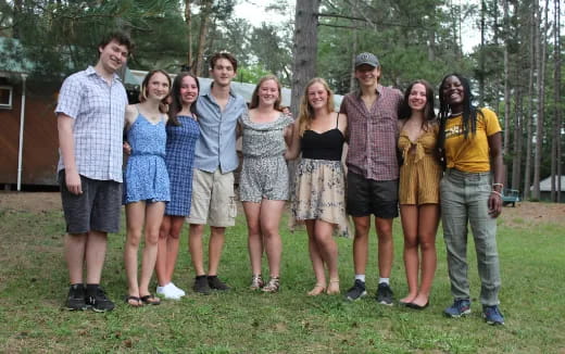 a group of people posing for a photo