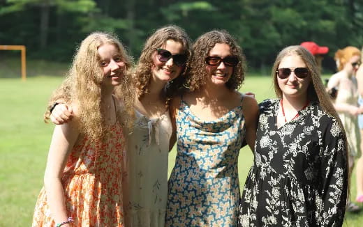 a group of women posing for a photo