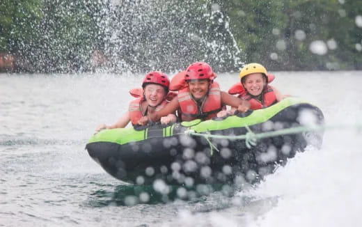 a group of people in a raft