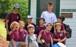 a group of children posing for a photo