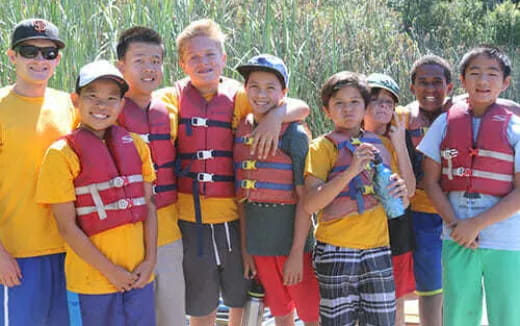 a group of people posing for a photo