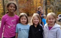 a group of girls smiling