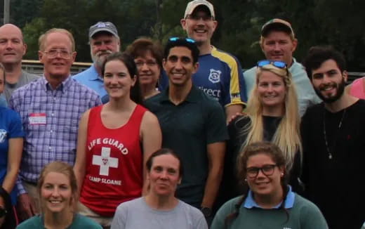 a group of people posing for a photo