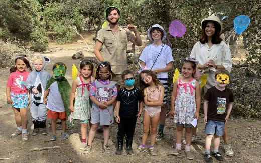 a group of people posing for a photo