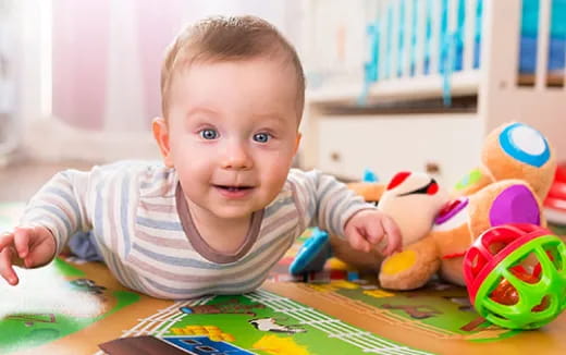 a baby playing with toys