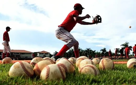 a baseball player throwing a ball