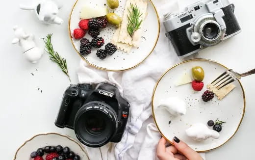 a camera and a plate of food