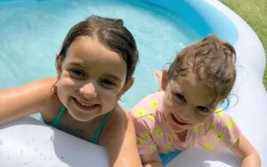 a couple of girls in a pool