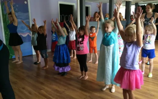 a group of children dancing