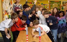 a group of children in a classroom