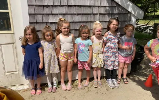 a group of children posing for a photo