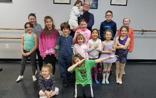 a group of children posing for a photo