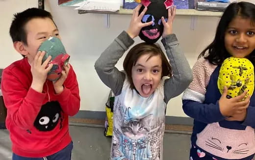 a group of kids holding toys