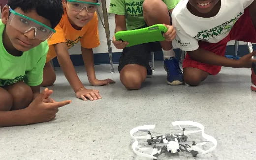 a group of kids playing with a toy