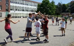 a group of people dancing outside