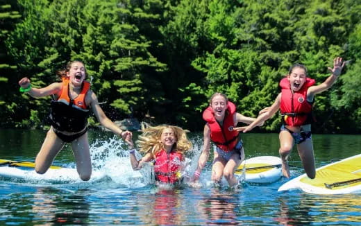 a group of people on water skis