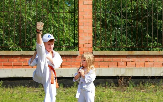 a man and a girl in white