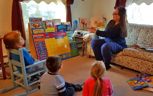 a person and children in a room