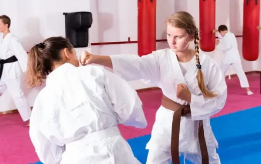 a person in a karate uniform