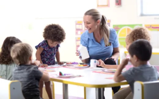 a teacher teaching her students