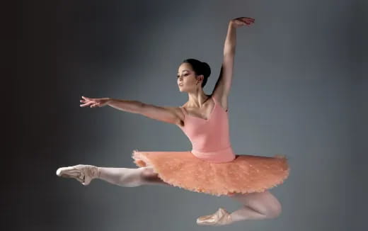 a woman dancing on a stage