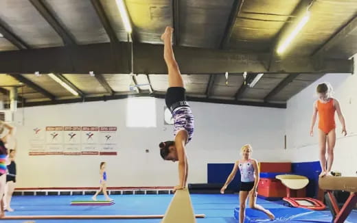 a woman doing a high jump