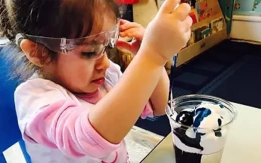 a young girl painting