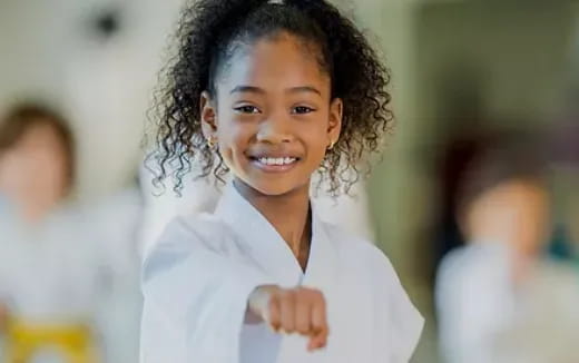 a young girl smiling