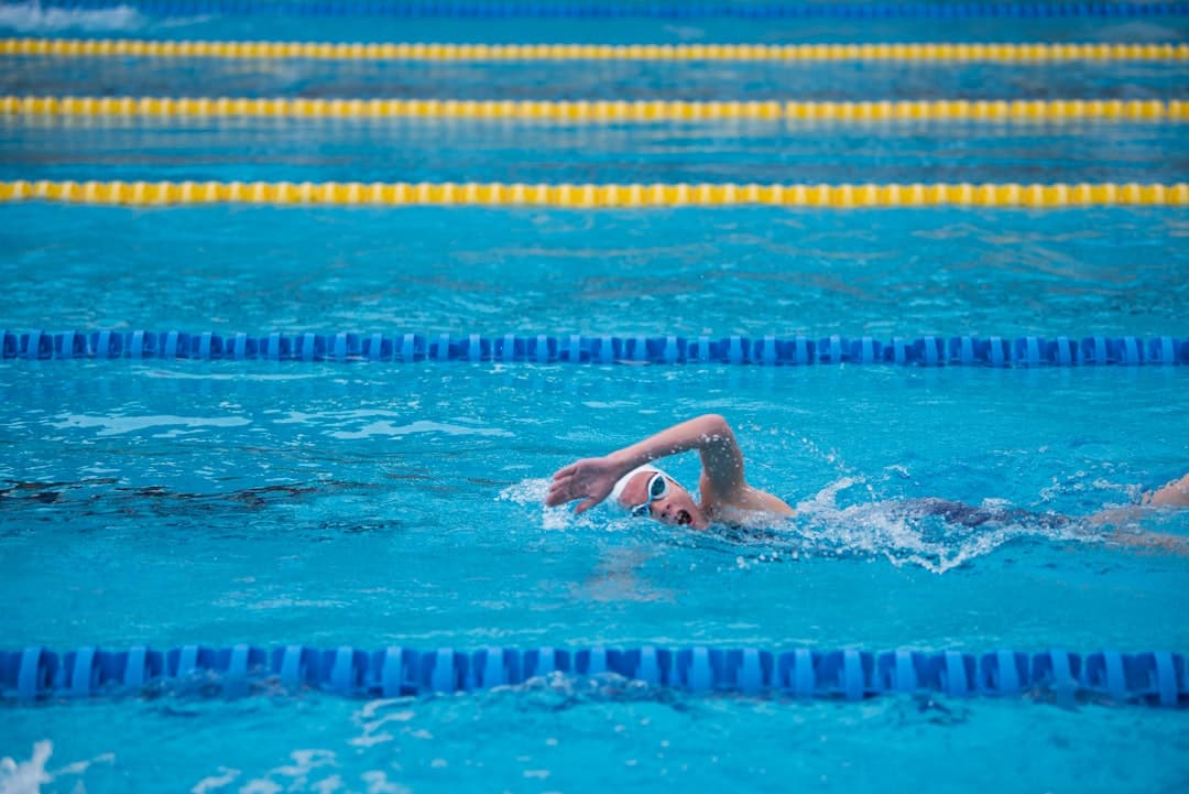 woman swimming on pool