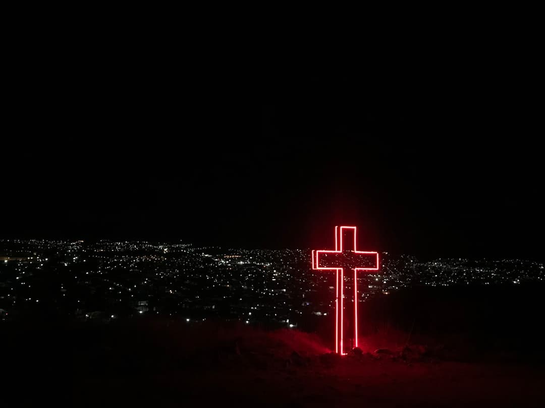 red neon light cross signage