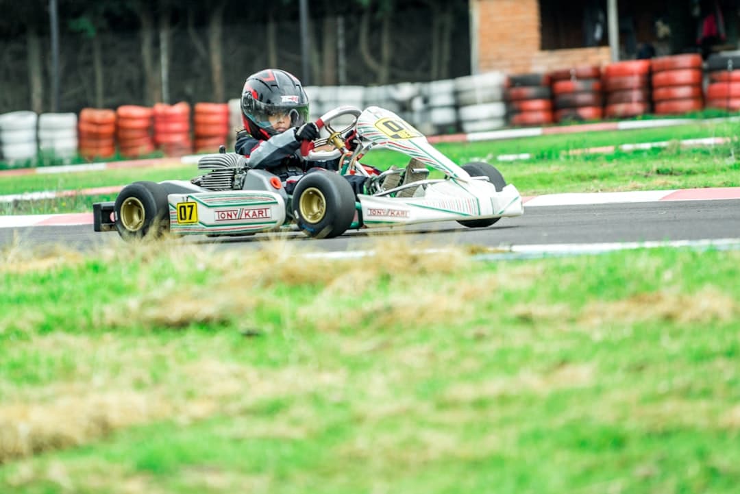 man riding on go-kart