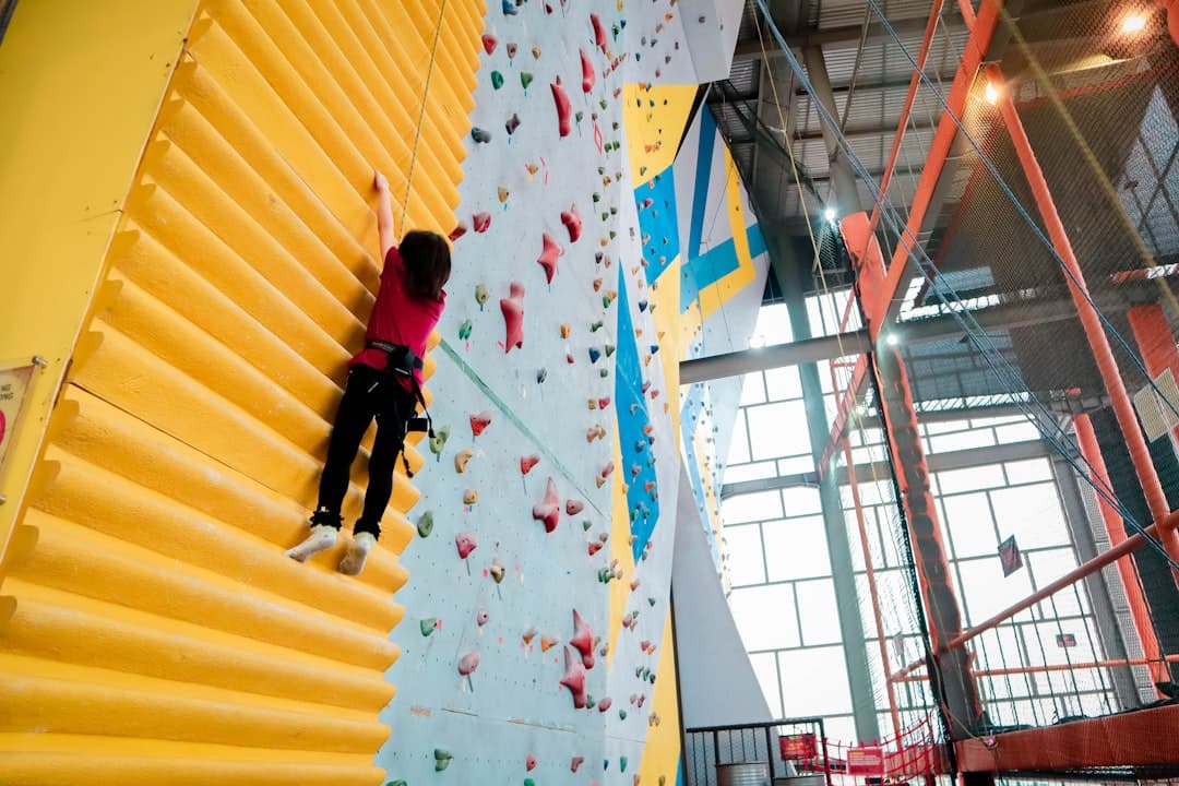 girl rock climbing indoor