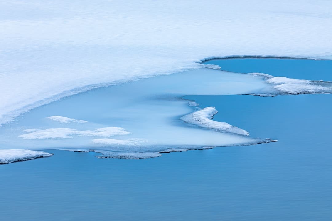 white and blue ocean waves