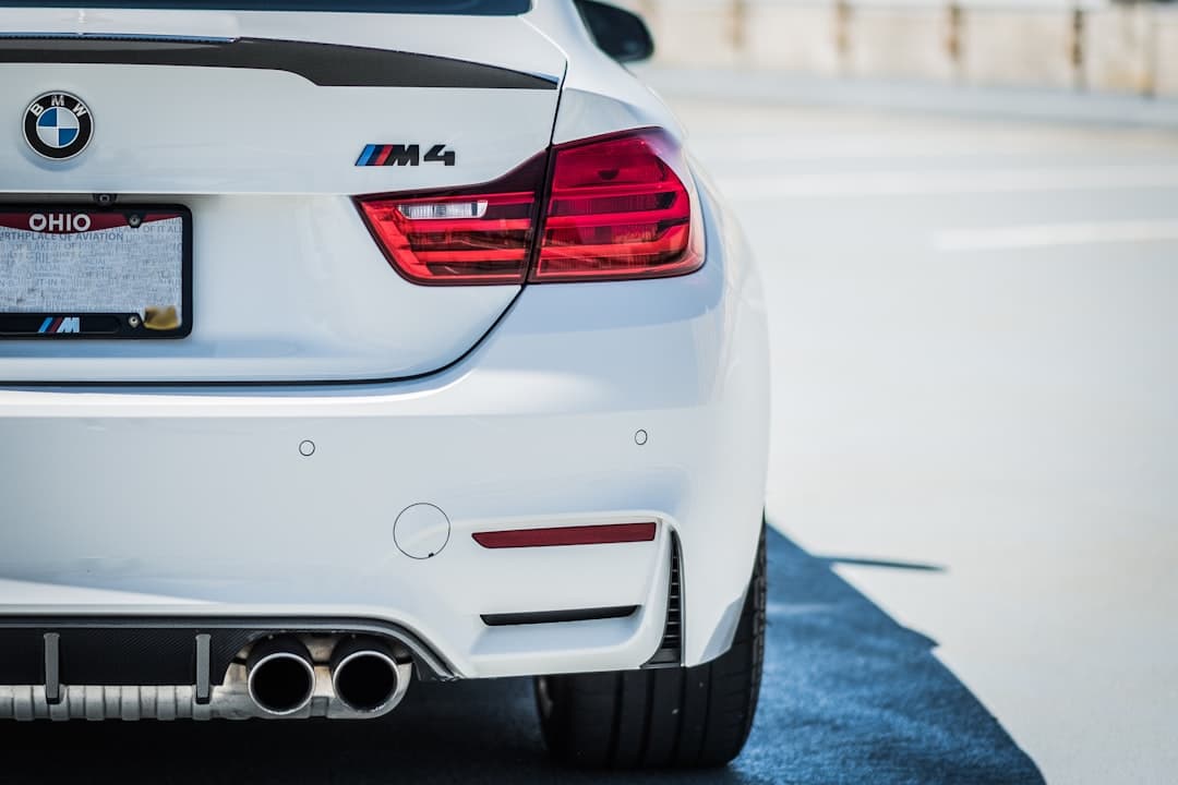 white bmw m 3 on road during daytime