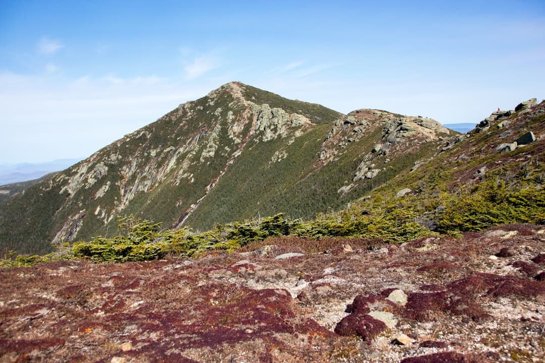 green and brown mountain under blue sky during daytime