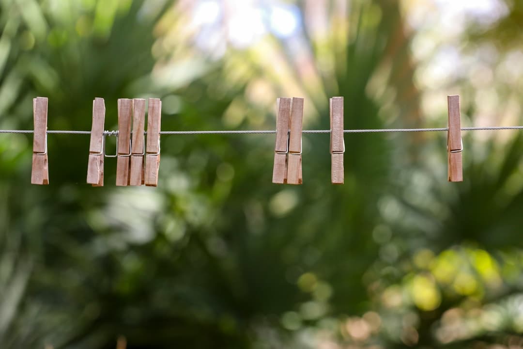 clothes pins are hanging on a clothes line