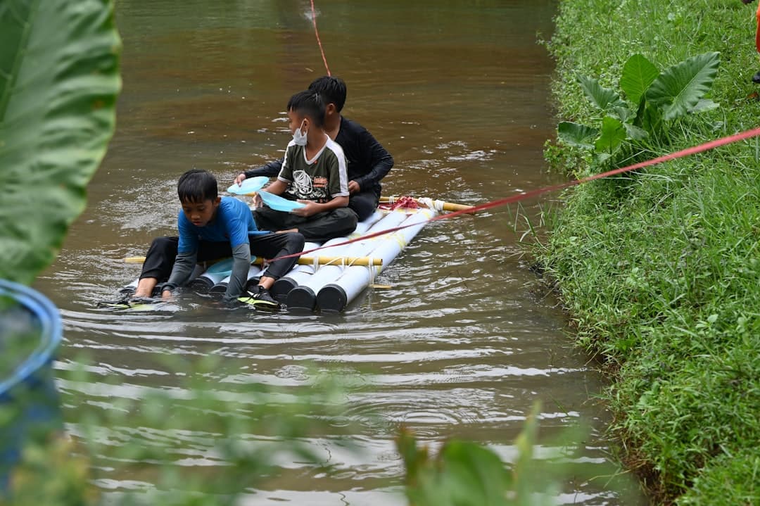 a group of people in a body of water